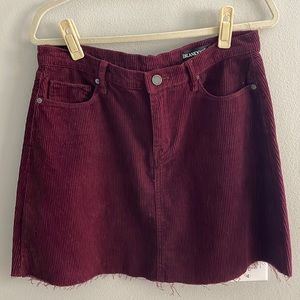 Unfinished hem corduroy skirt